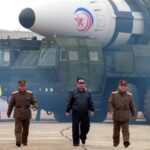 North Korean leader Kim Jong Un walks away from what state media report is a "new type" of intercontinental ballistic missile (ICBM) in this undated photo released on March 24, 2022 by North Korea's Korean Central News Agency (KCNA). KCNA via REUTERS    ATTENTION EDITORS - THIS IMAGE WAS PROVIDED BY A THIRD PARTY. REUTERS IS UNABLE TO INDEPENDENTLY VERIFY THIS IMAGE. NO THIRD PARTY SALES. SOUTH KOREA OUT. NO COMMERCIAL OR EDITORIAL SALES IN SOUTH KOREA.     TPX IMAGES OF THE DAY